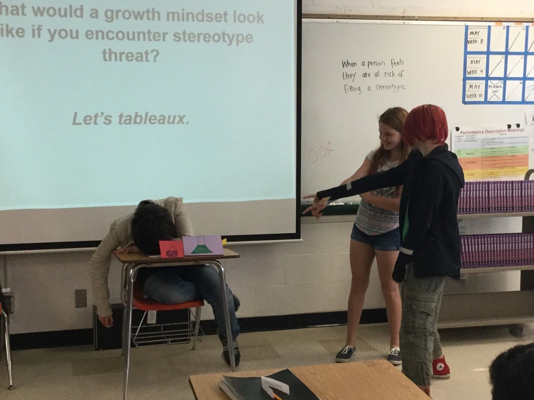 Elissa, Claire and Fern tableaux the stereotype that a woman can’t keep up with the demands of a career in science the way a man can.