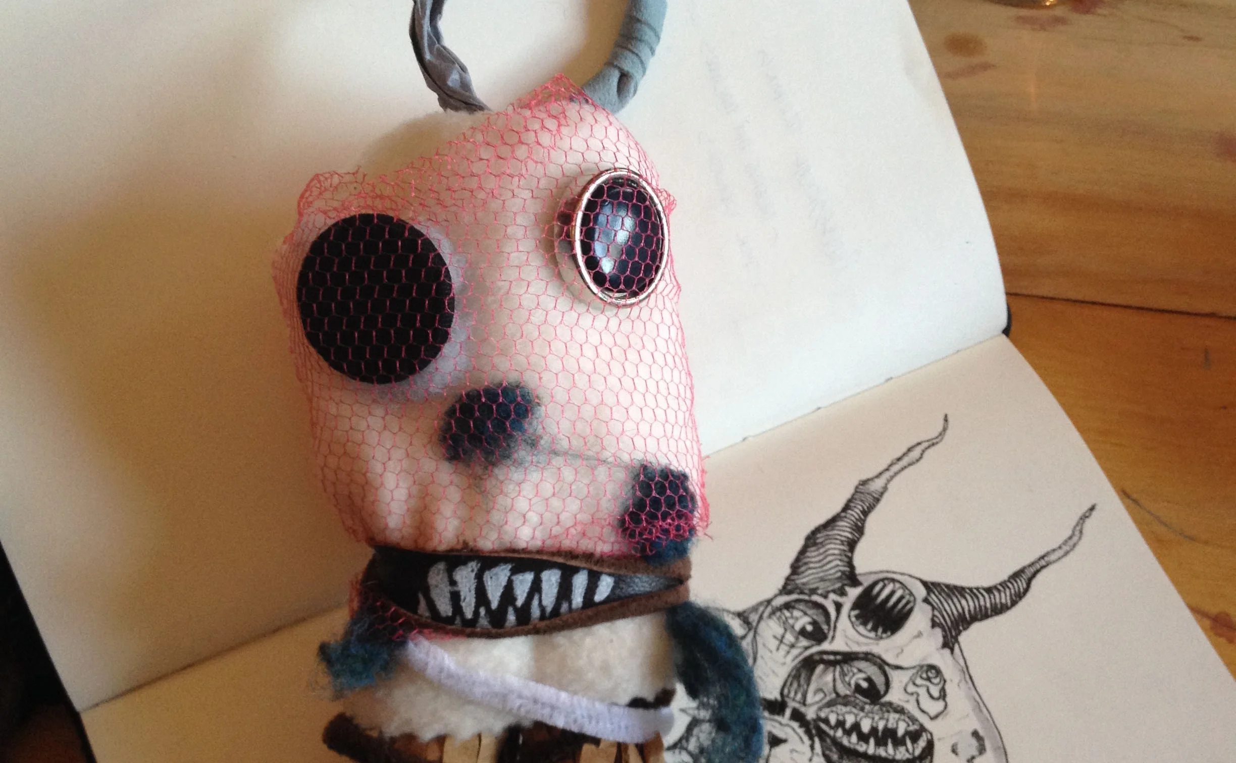 3D representation of math anxiety. You can see in the background the original drawing of the anxiety monster.