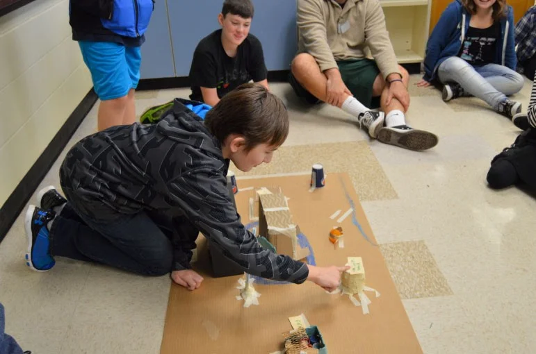 Figure 4: Josef Bonham, CMS 8th grader, presenting his Neolithic Civilization Model
