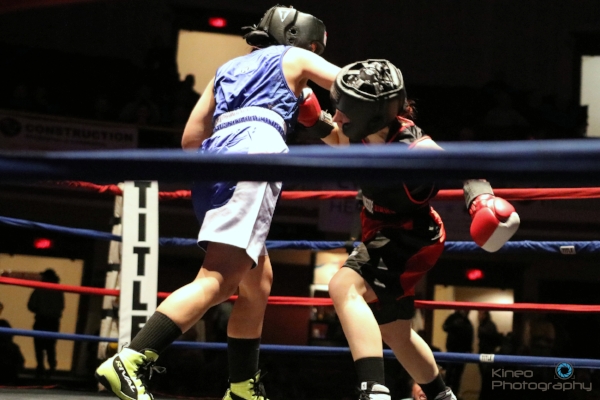 Portland Boxing Club's Kate Zehr (right) at the New England Golden Gloves novice semi-finals in Lowell, MA. Photo courtesy of Kineo Photography.