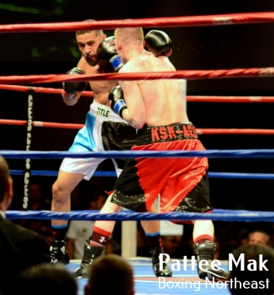 Portland Boxing Club's Casey Kramlich (right, red trunks) at Twin River Casino on April 7, 2017. Photo courtesy Pattee Mak, Boxing Northeast.
