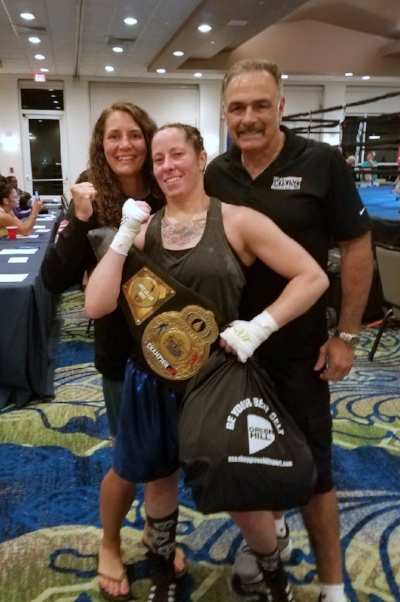 Portland Boxing Club's Lindsday (Kyajohnian) Francois (left) who won bronze and Liz Leddy (center) who won gold along with head coach Bobby Russo (right) at the 18th Annual Women's National Golden Gloves in Fort Lauderdale, FL.