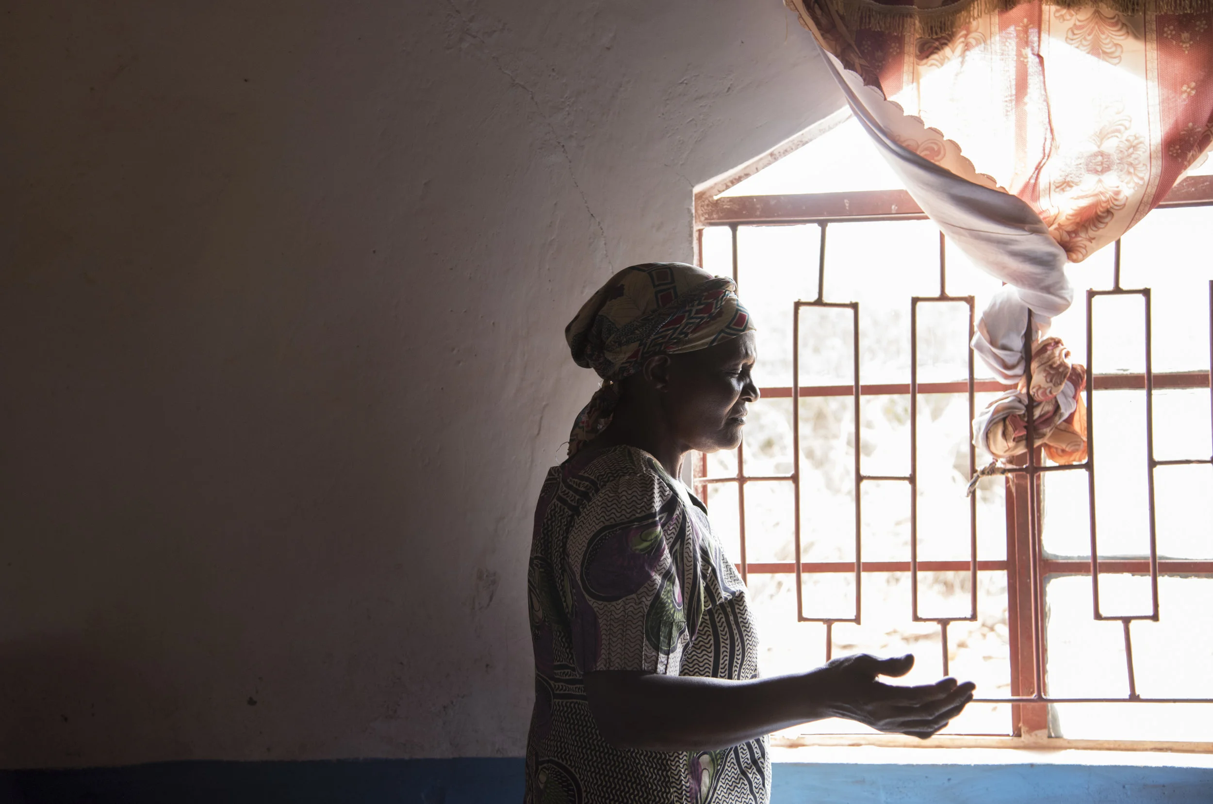  Churchgoers pray during a service in Kasigau, Kenya on June 5, 2016. 