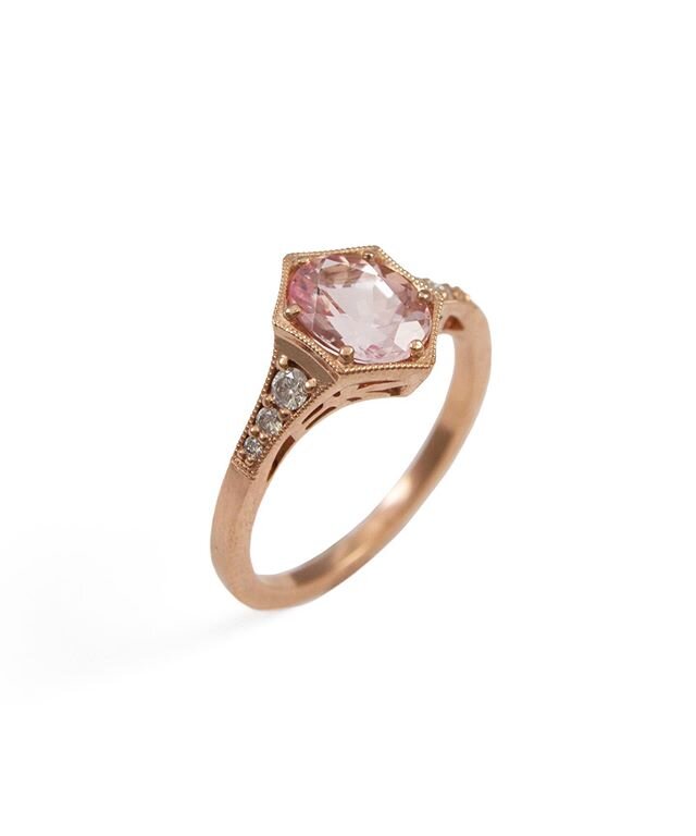 This custom engagement ring was so much fun to create start to finish! It is 14k rose gold, with a morganite center stone and diamonds down the sides. While we are currently closed to the public we are answering emails and working in the shop. We wou