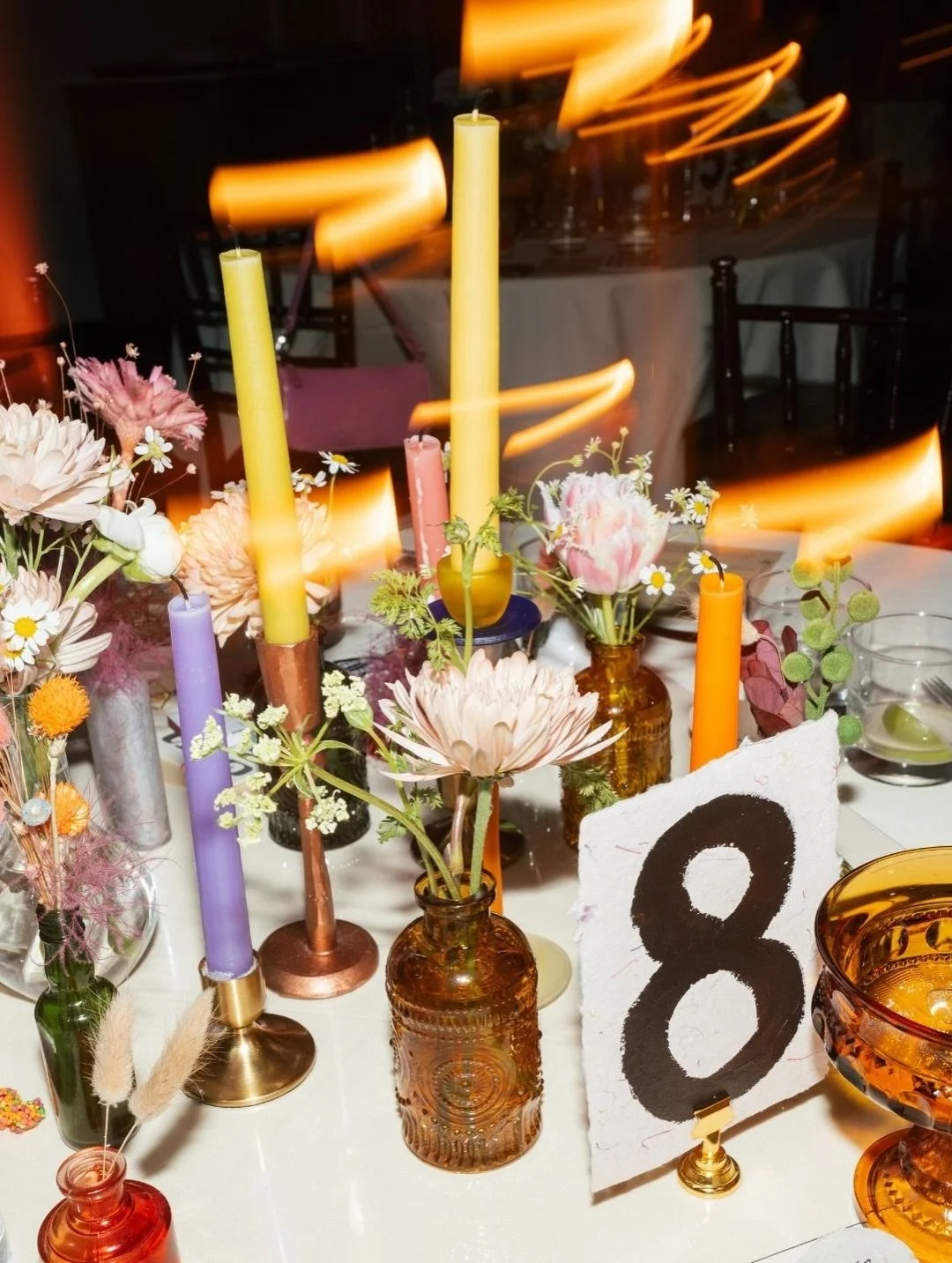 Harrison and Arianna, lovingly known as Harianna, created an eclectic and deeply personal wedding rooted in love and intention. From Harrison&rsquo;s screen-printed invitations to Arianna&rsquo;s giant handmade flowers transforming their ceremony and