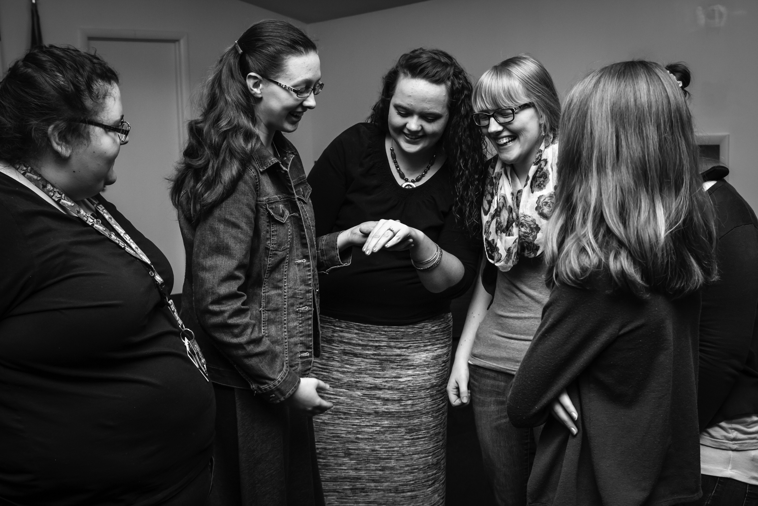 Emilea had several of her girlfriends there to witness the event and they all flocked to see the gorgeous ring after all was said and done!!!