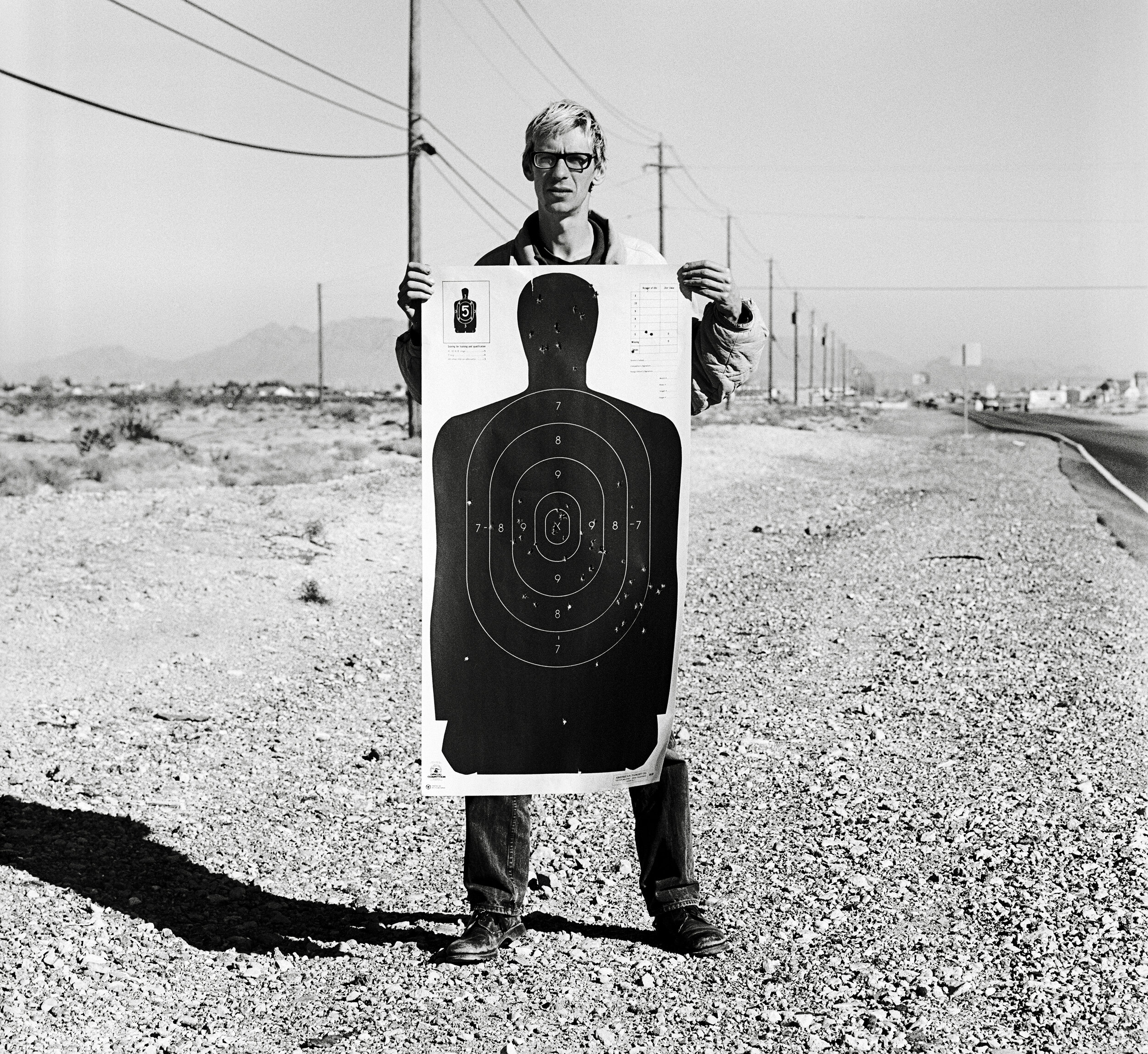 Flake holding a target, Las Vegas, 1997.jpg
