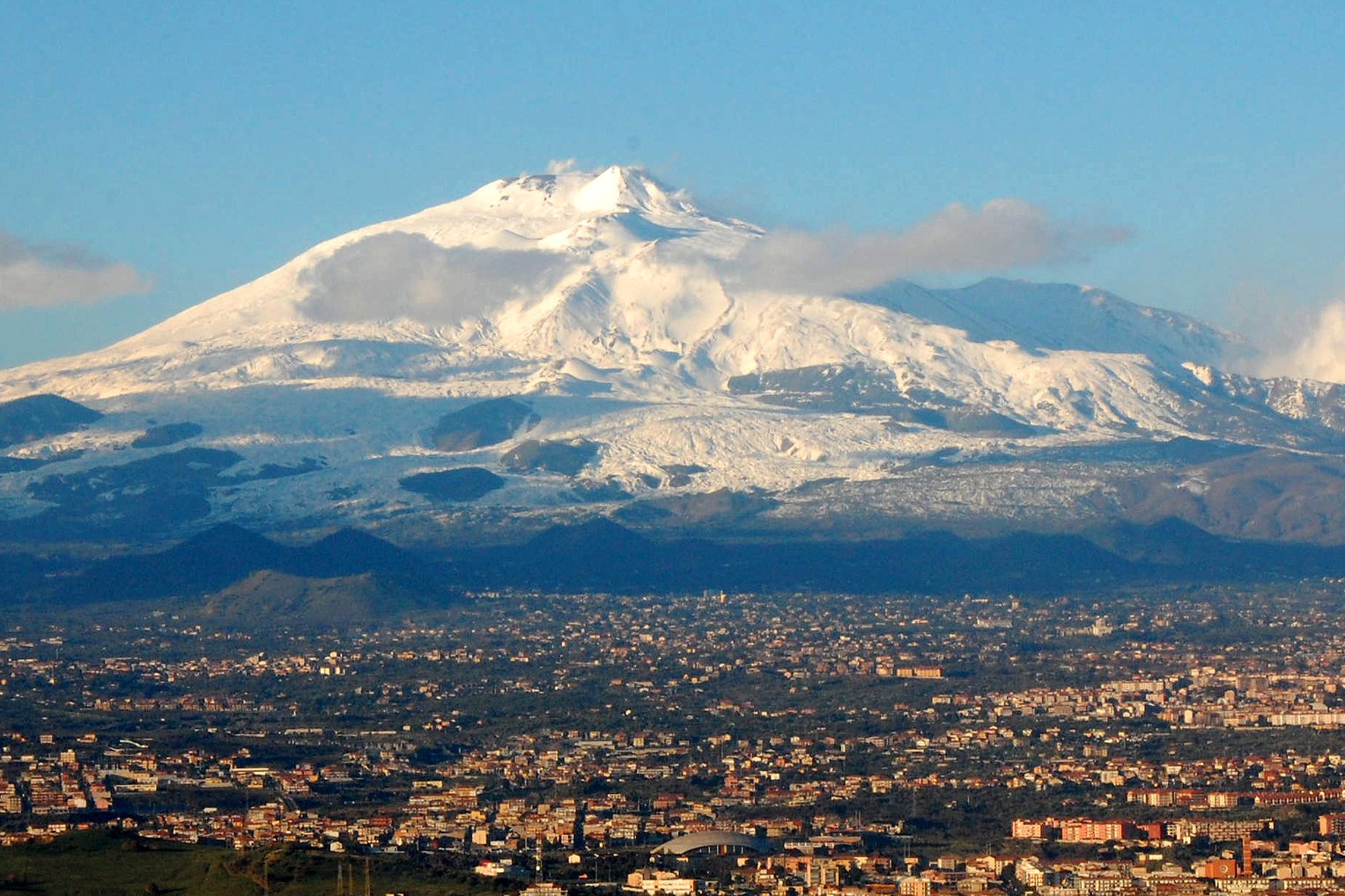 Mt. Etna looming over Catania