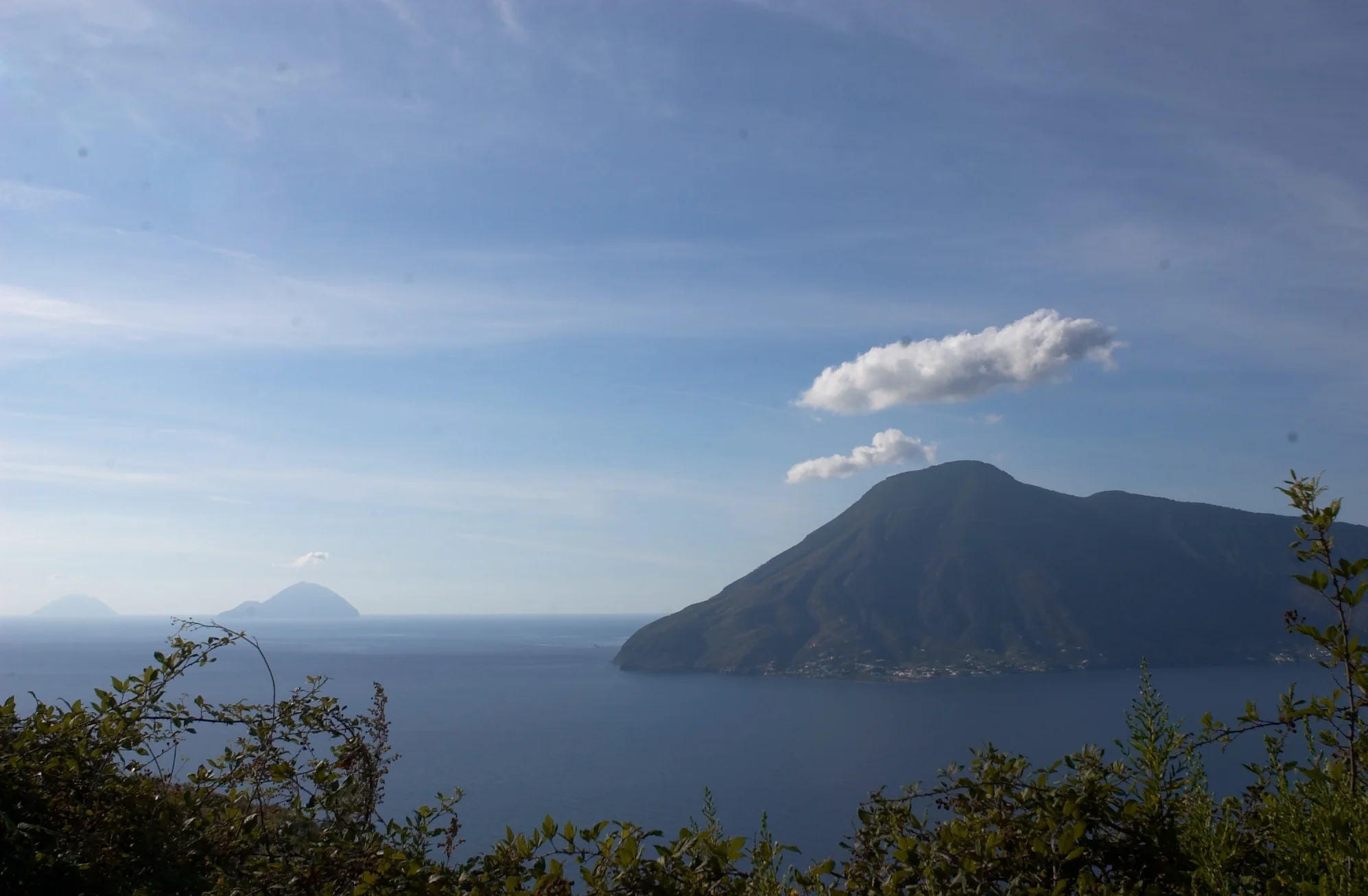 Salina Island, as seen from Lipari. Filicudi and Alicudi islands in the background. (Aeolian Islands)