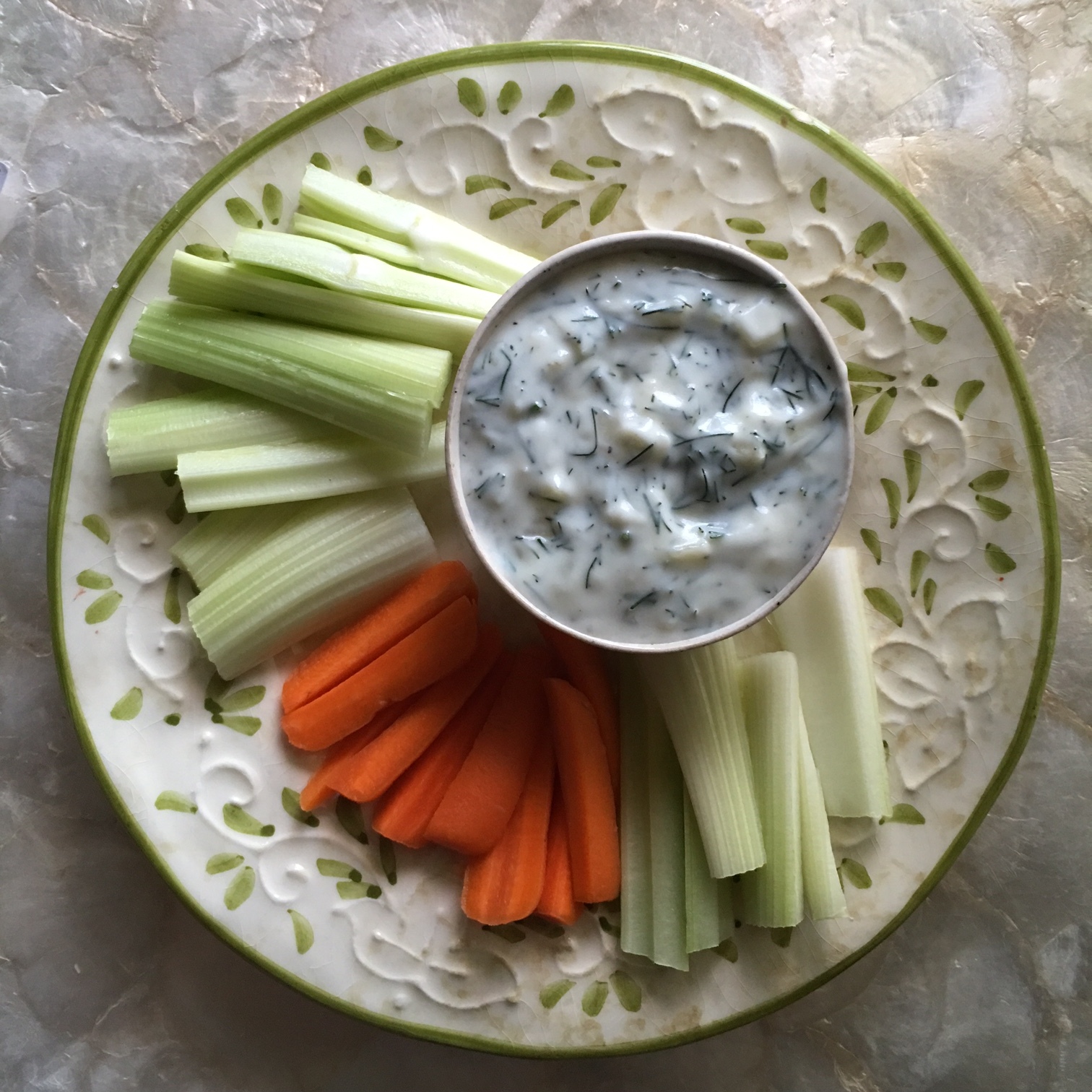    Greek Tzatziki Dip with chopped celery and carrots...   