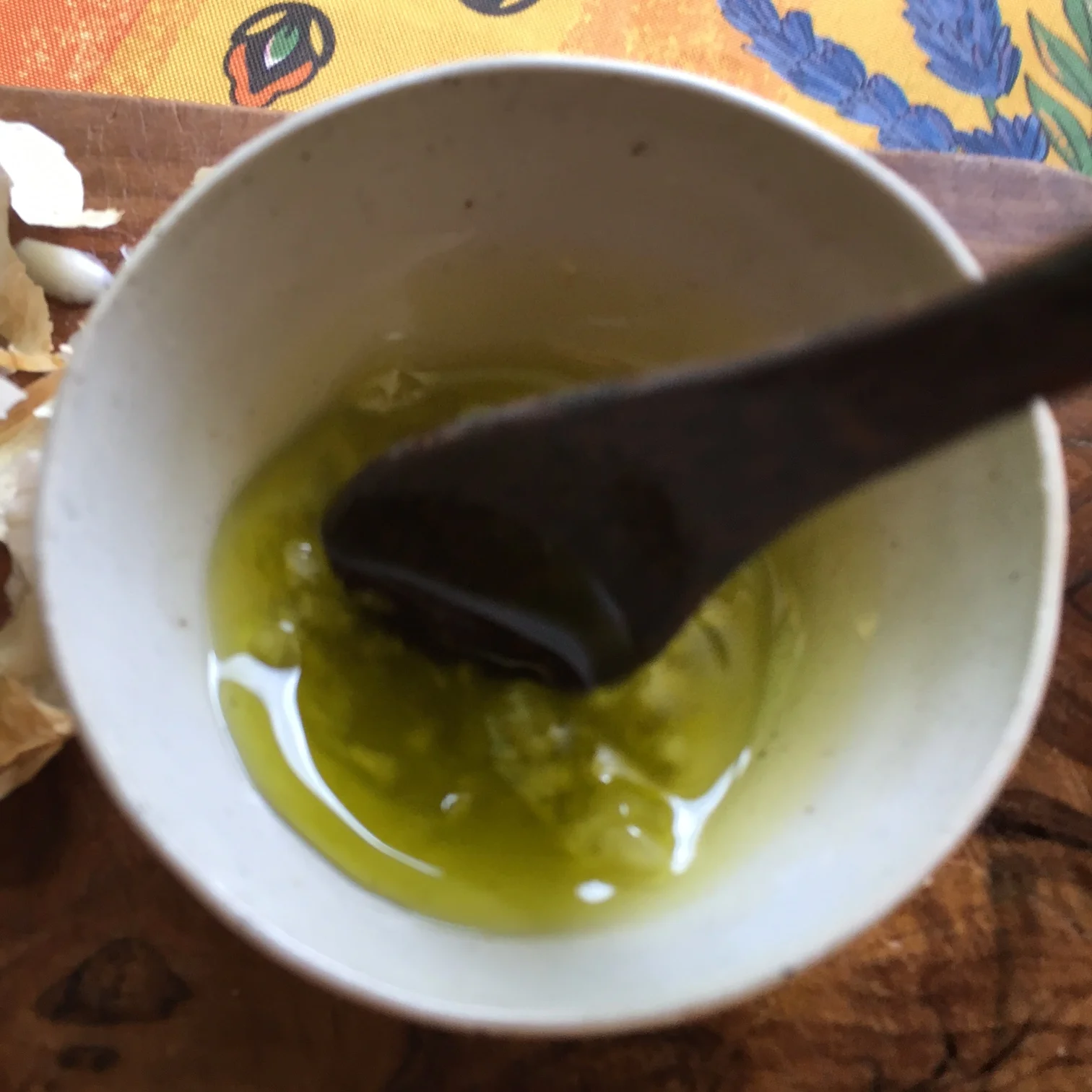   mixing mashed garlic and olive oil...   