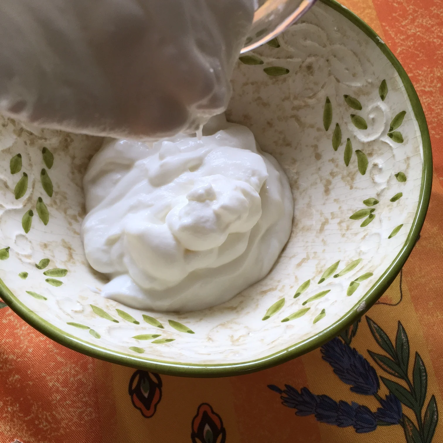    pouring yogurt in a bowl...   