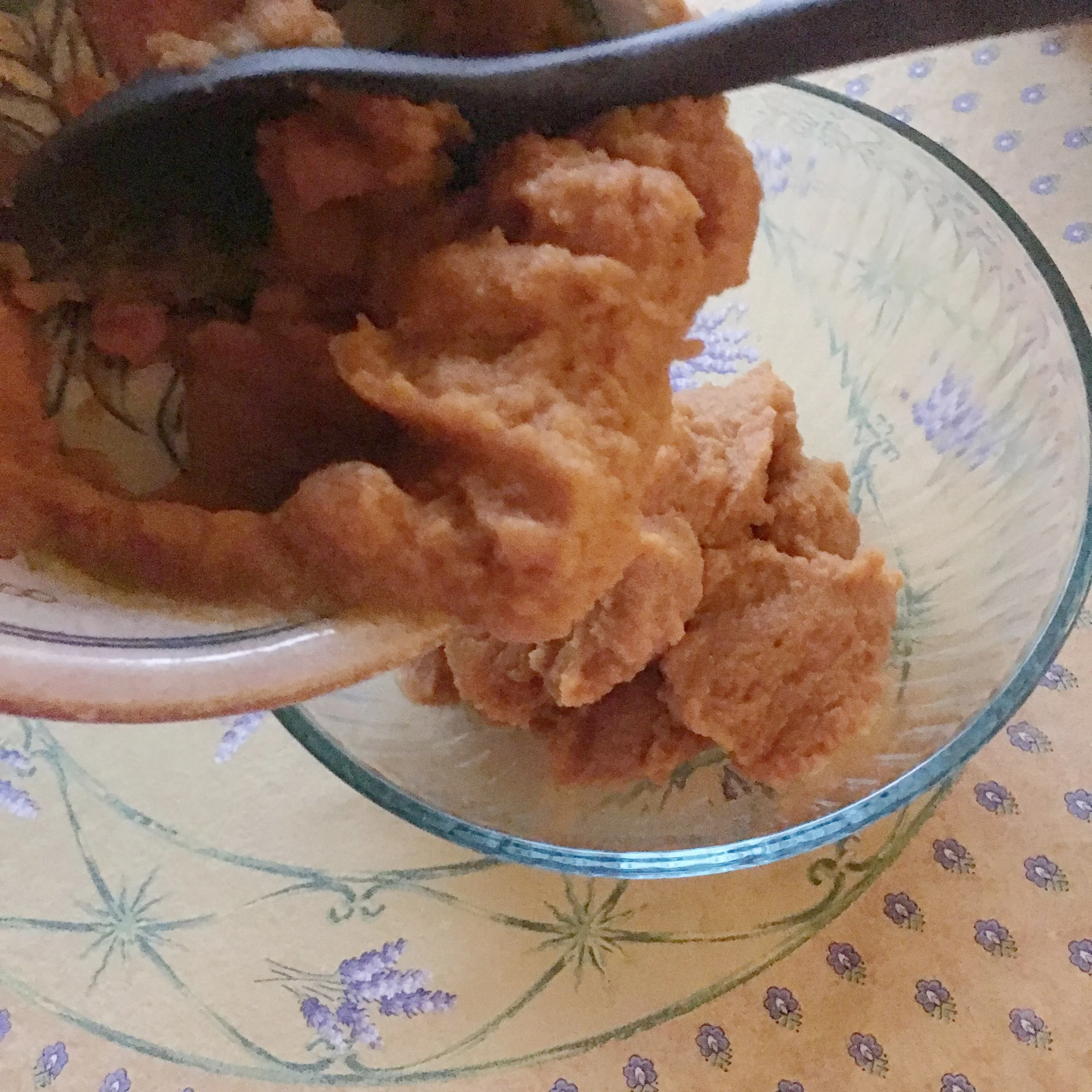    adding pumpkin puree to mixing bowl...   