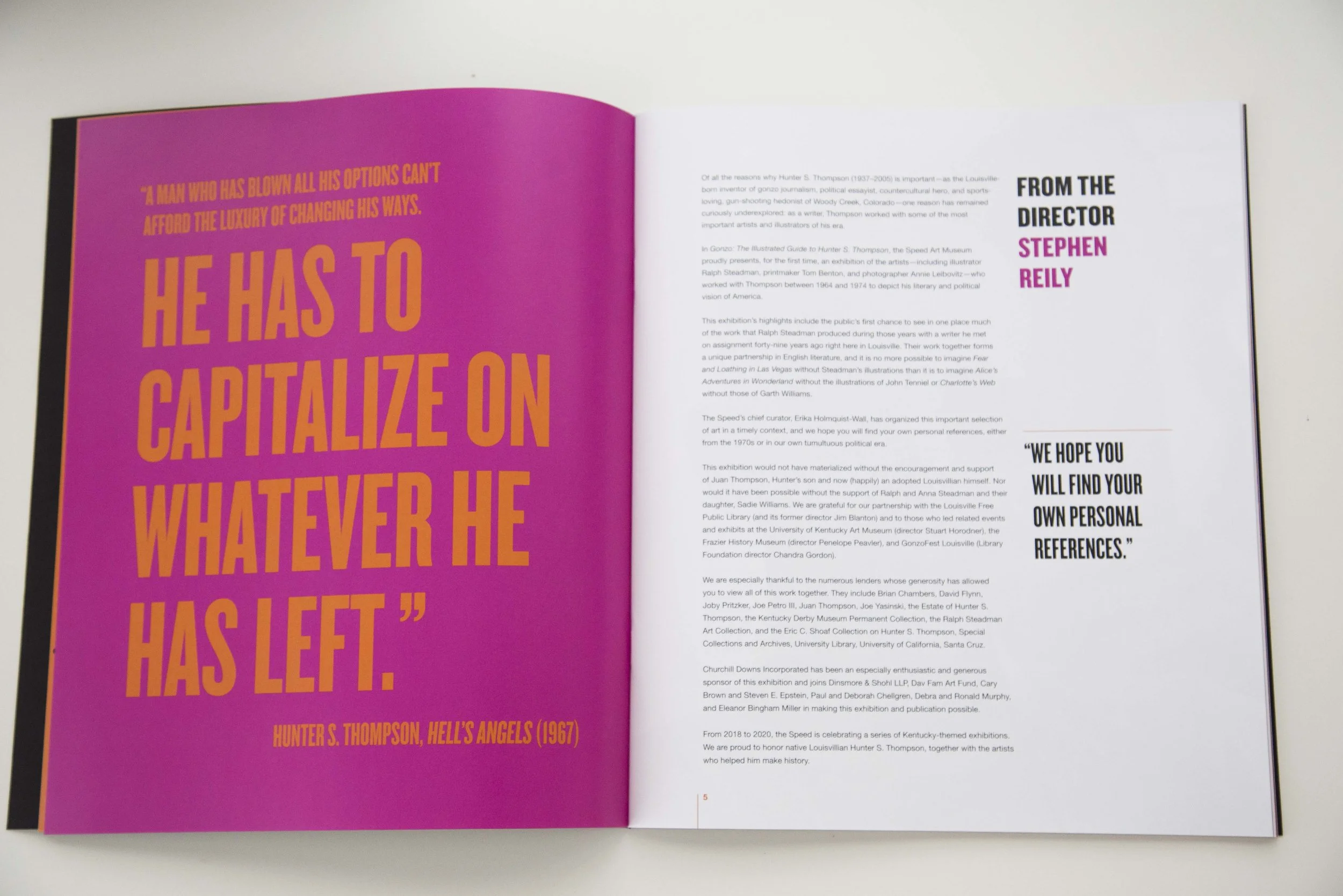 The large quotes and neon colors boldly interrupt the book.