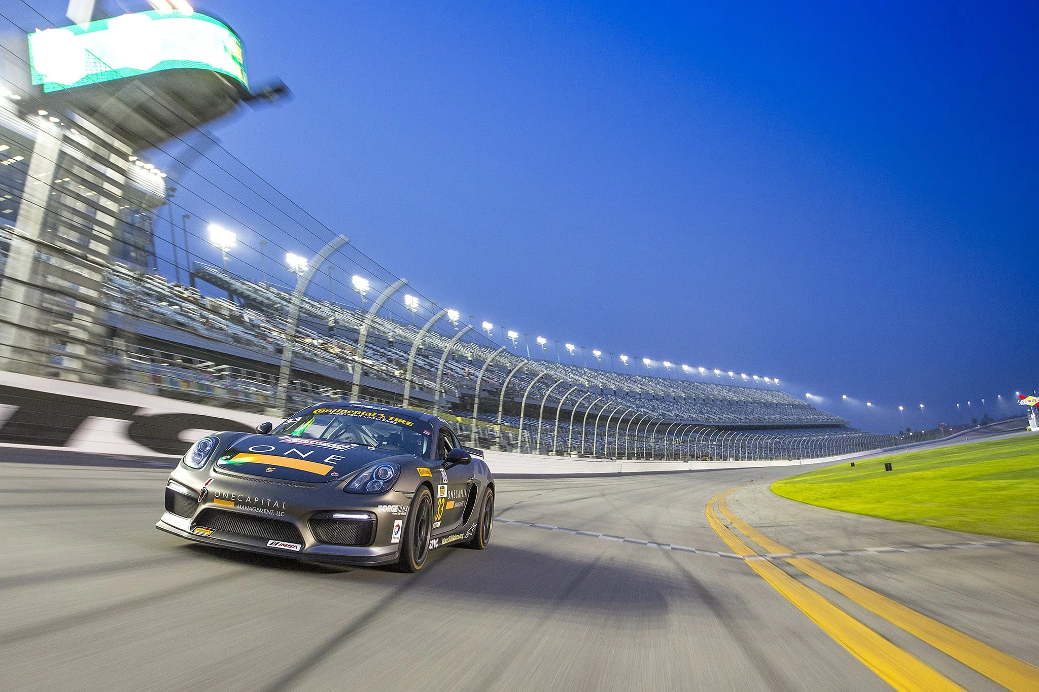 CJ Wilson pilots his new Porsche Cayman GT4 Clupsport. CJ Wilson Racing.