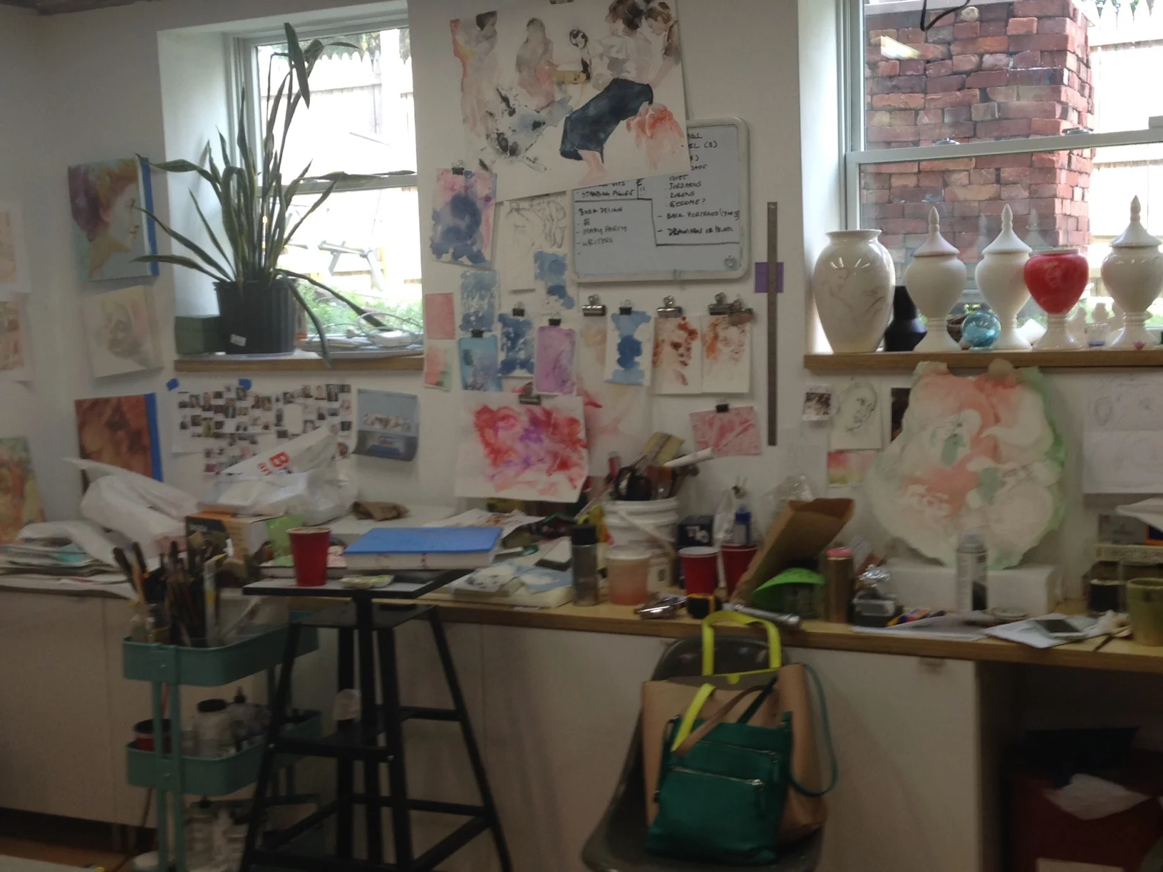 One wall of Angie's studio has these windows, and the enticing debris of creativity-in-progress.