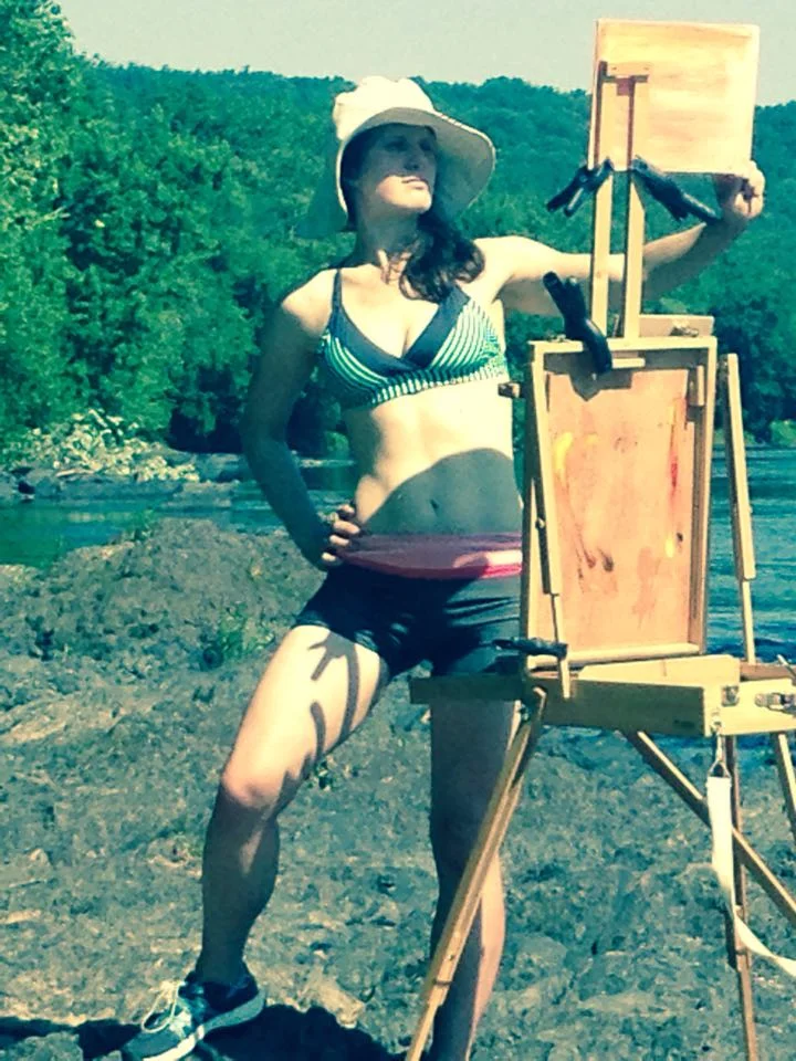 My son took this picture of me painting in my bathing suit.