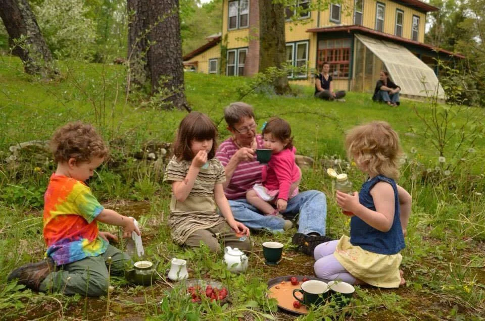 A fairy-tea-party in Grammy's yard with four happy grandchildren, a few years ago.