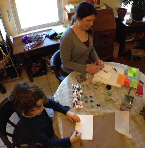 Painting color strips with my six-year-old son...