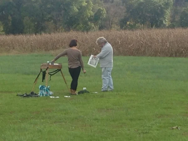 Here’s a photo of the teacher, JD, giving some guidance to Kristen.