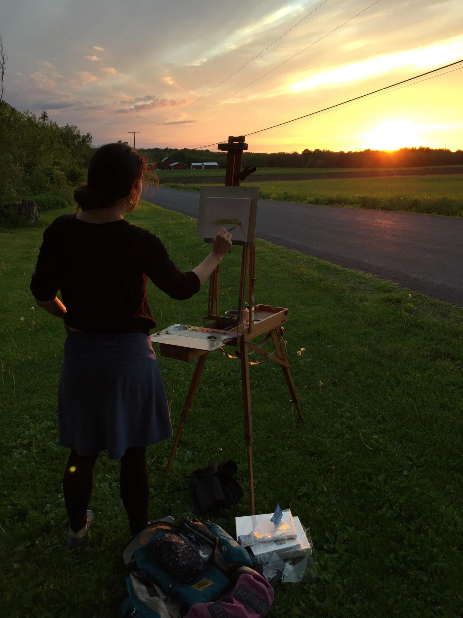 me painting a sunset on a farm road in Groton, New York