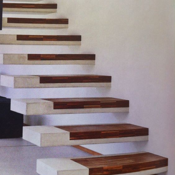 Floating concrete treads with timber inlay. Designer unknown.