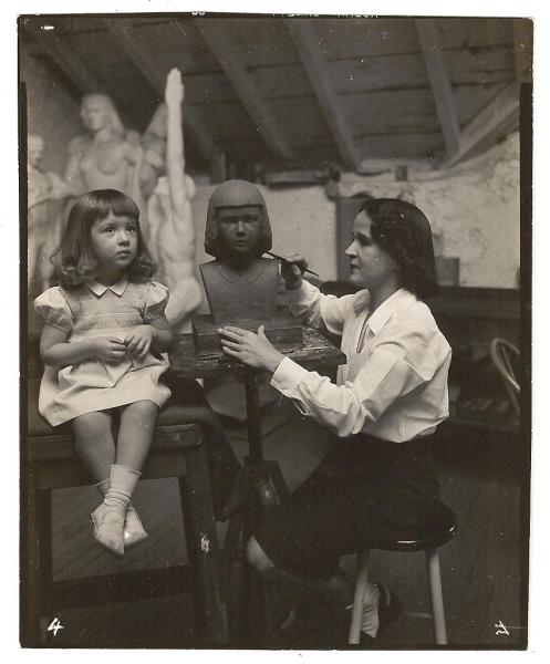 Maurine Gibbs working on a sculpture of Ramona in her Rosemont, Pennsylvania studio, 1947