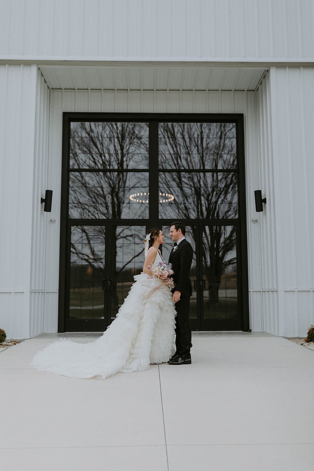 Romantic wedding styled shoot at Cliffside Acres. Bride is wearing Ross by Rivini, a textured ball gown wedding dress.