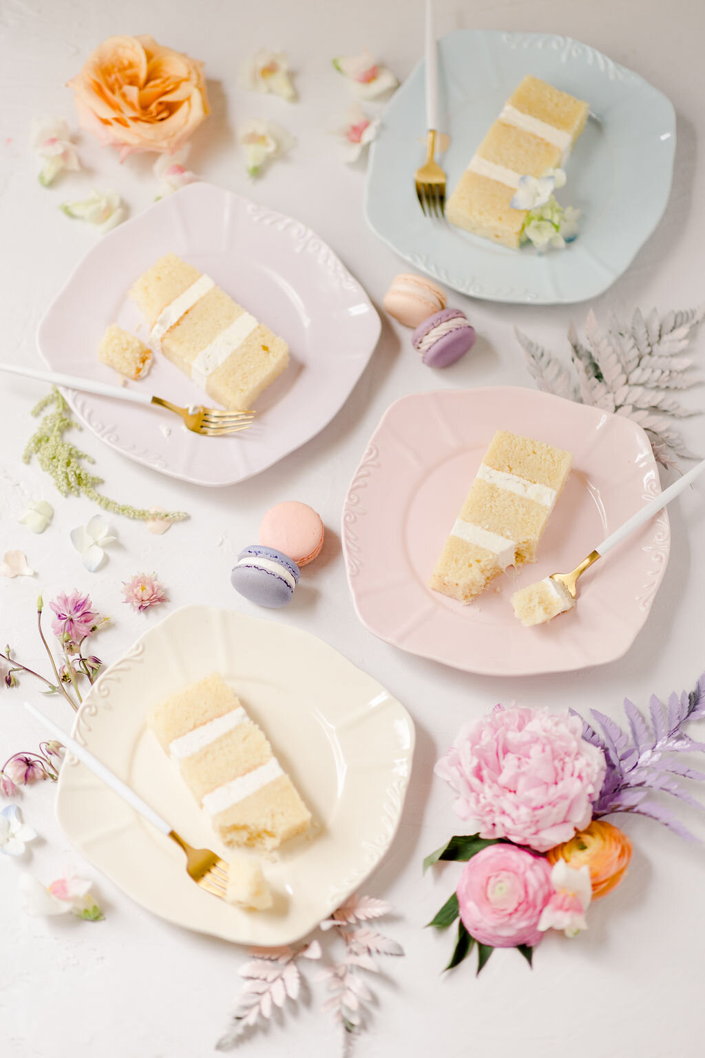 Colorful pastel wedding cake plates.