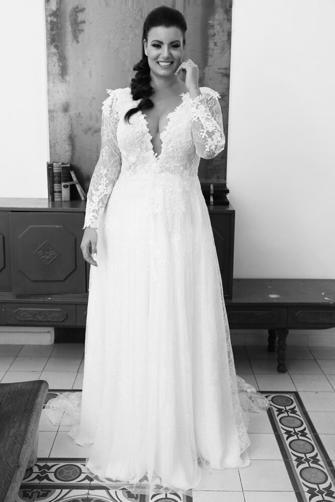 Model wearing Studio Levana Daisy bridal gown.