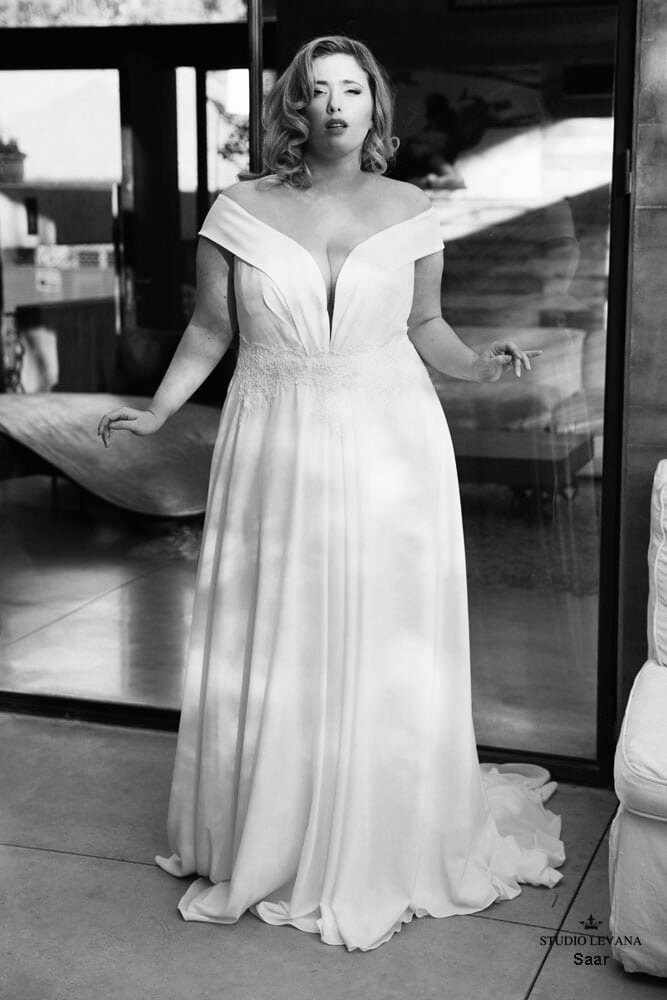 Model wearing Studio Levana Saar bridal gown.