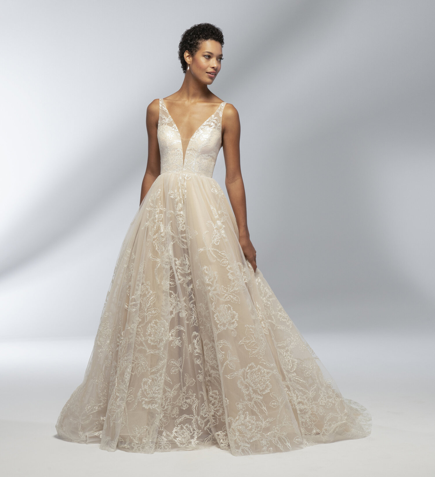 Model wearing Tara Keely Savannah ball gown wedding dress.