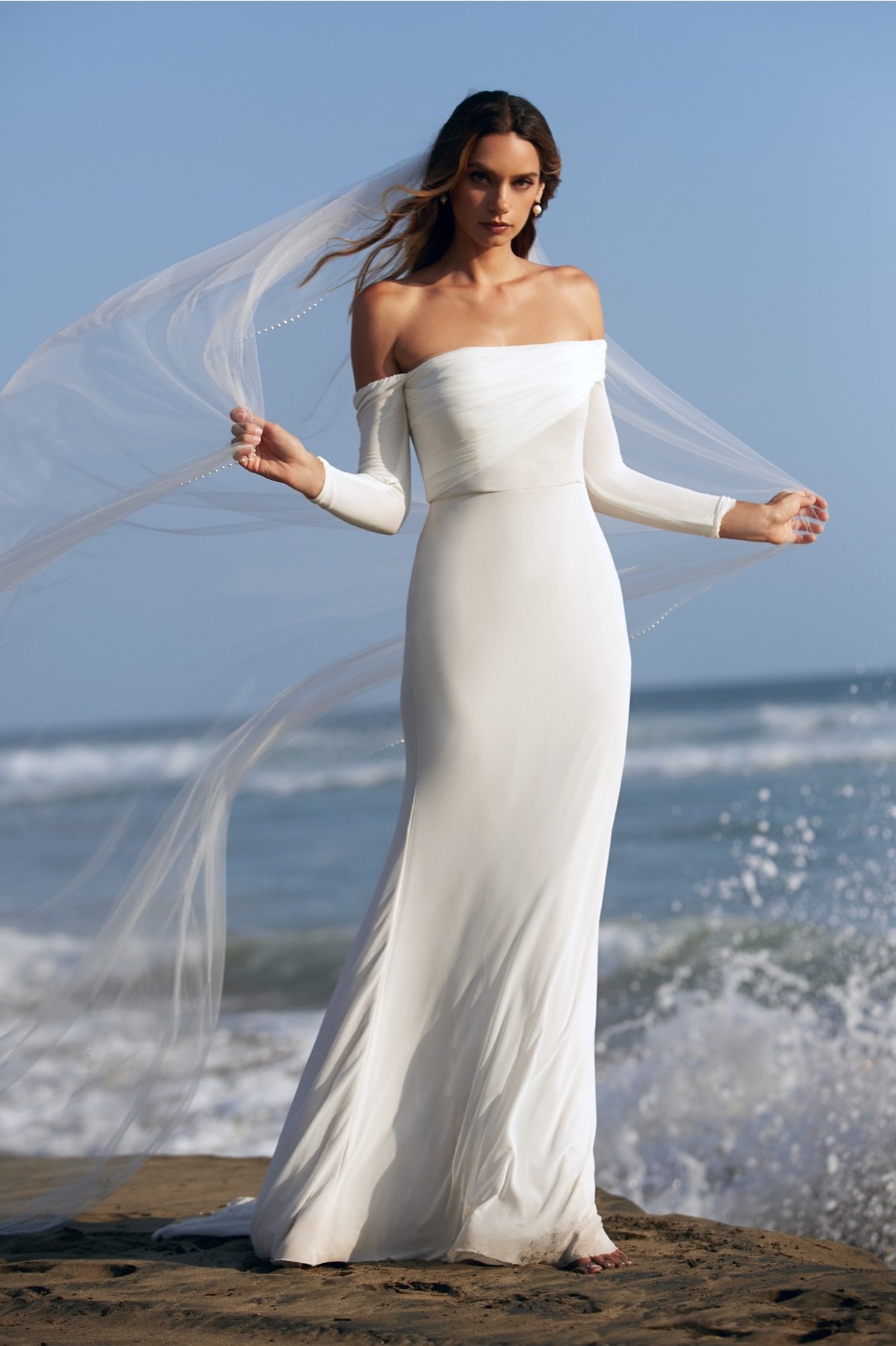 woman wearing Wtoo Milligan sheath wedding dress