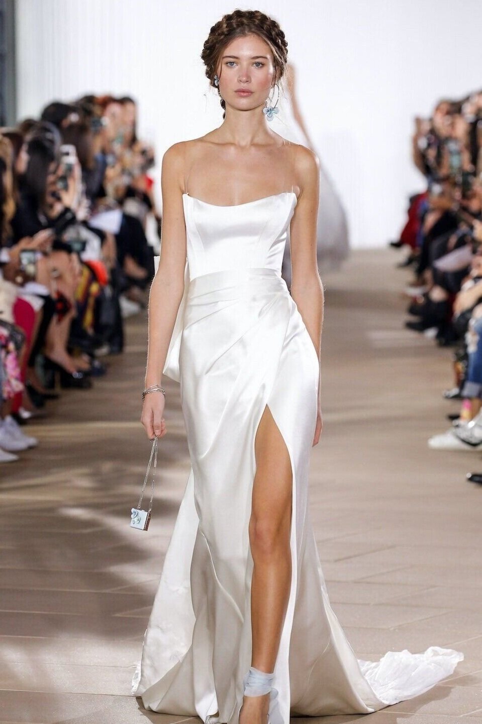 woman wearing Ines Di Santo Margot strapless high slit wedding dress