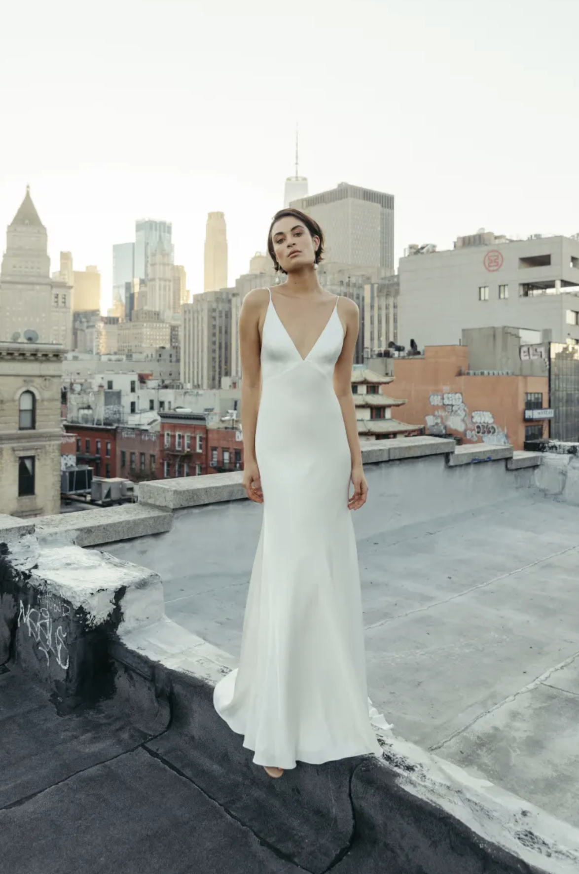 woman wearing Jenny Yoo Marnie slip wedding dress