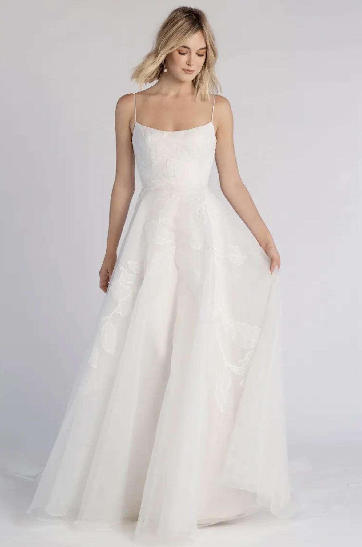 woman wearing Jenny Yoo Abernathy a-line wedding dress