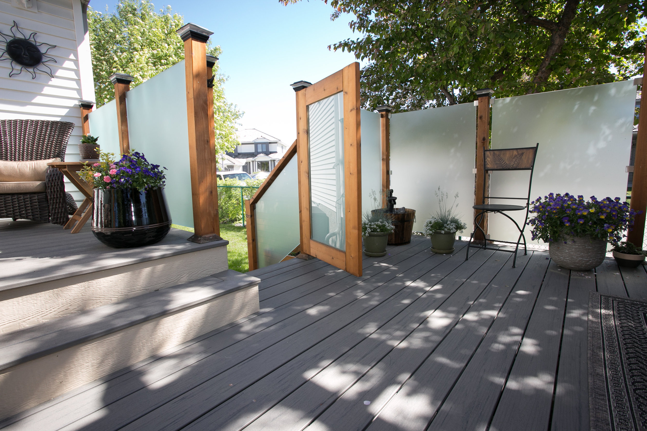  Multi-level composite deck with privacy panels — Valley Ridge, Calgary. 