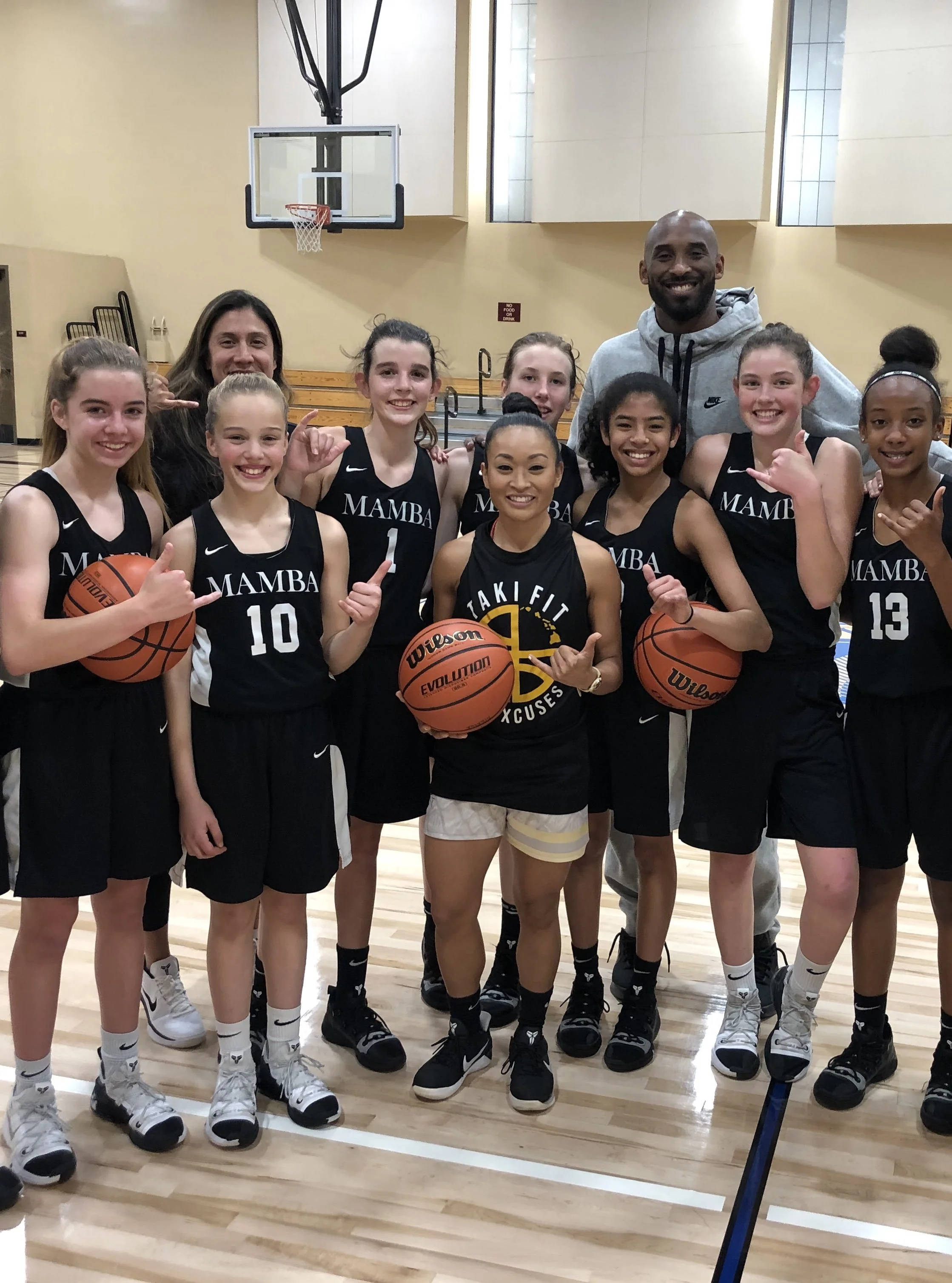 Coach Sarah working with athletes on The Mambas delivering structured training and development-focused sessions.