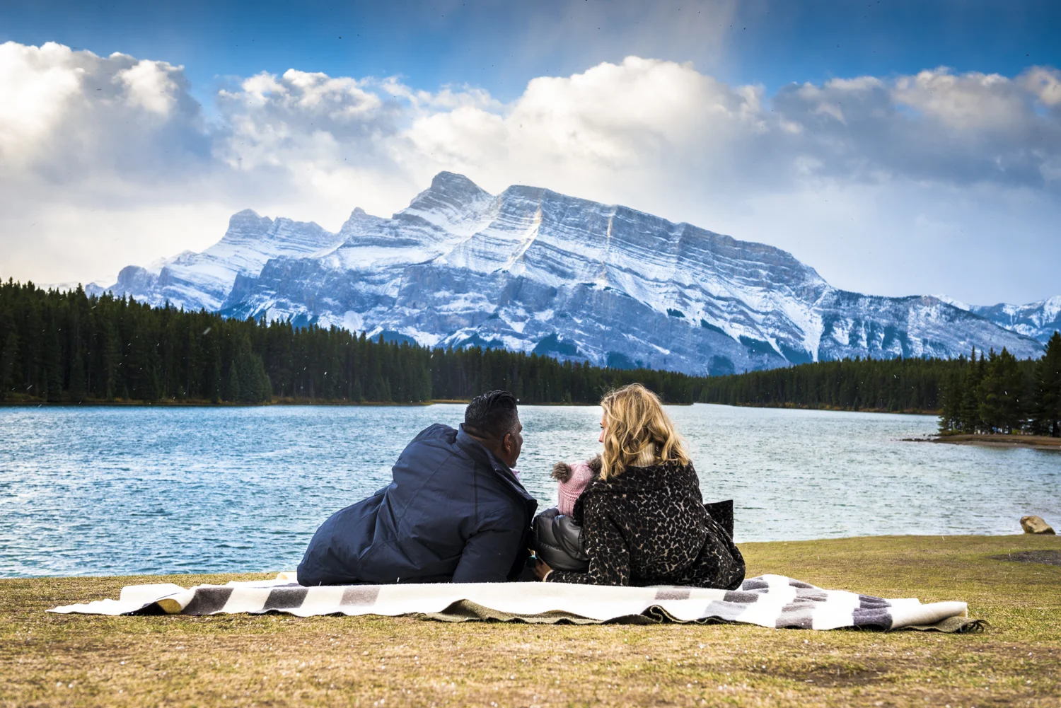Rachel, Miraj & Charlotte's family photography session at Lake Minnewanka in Banff National Park.