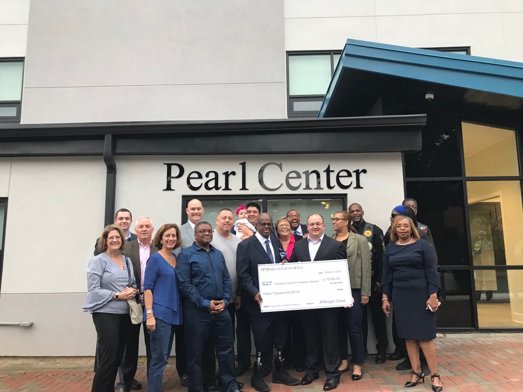 pearl center group photo big check.jpeg