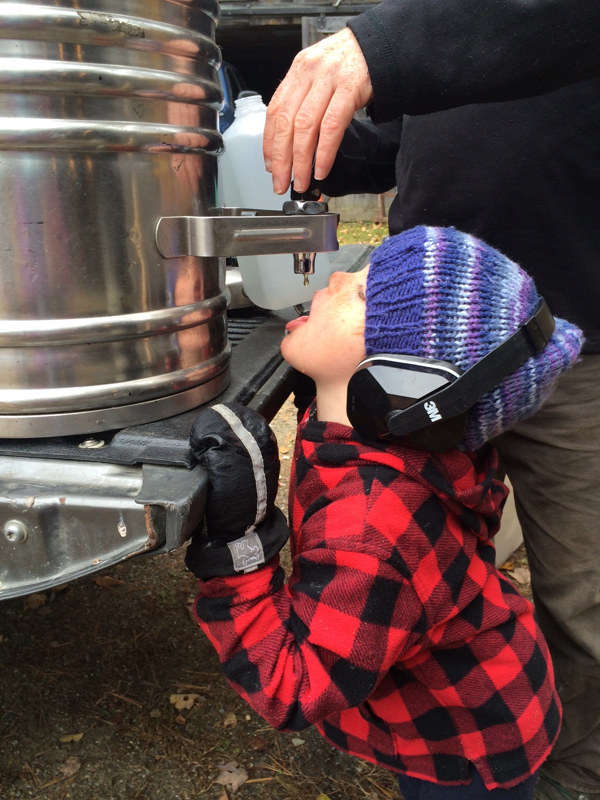 Finally a small pump transfers the cider to a canner where we bottle (and drink) it.