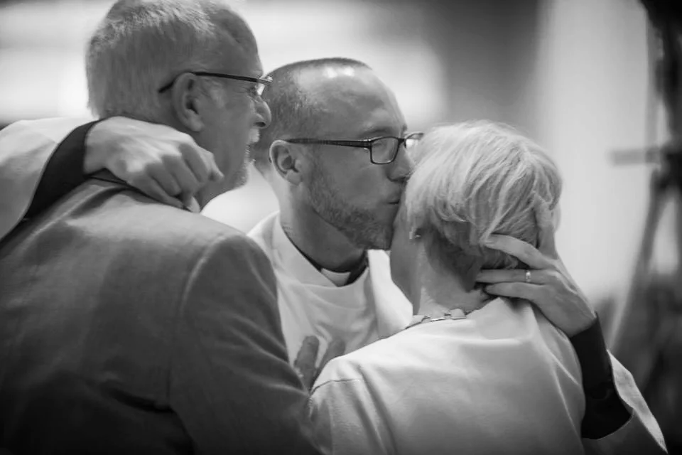 Patrick and parents at ordination ceremonu.jpg