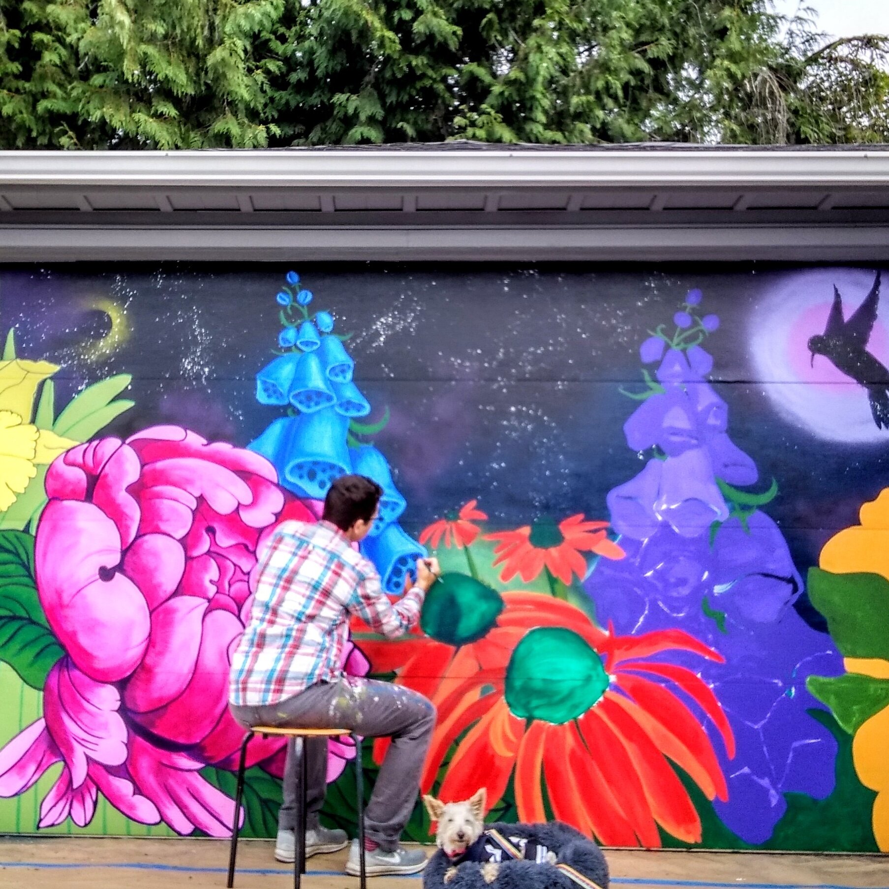 Colorful Floral Garden Garage Mural: Artist working