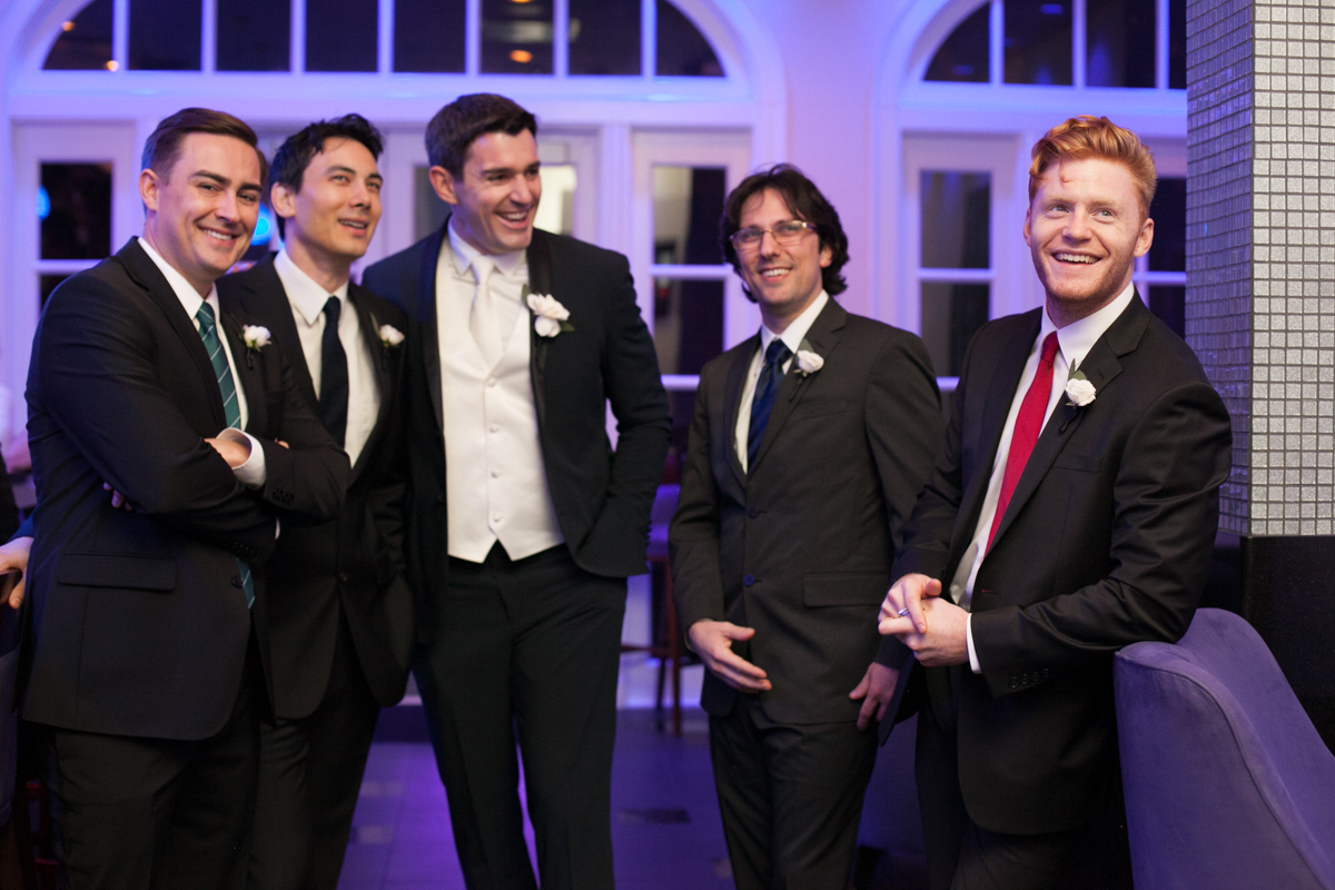 new Orleans weddings groomsmen at the bar