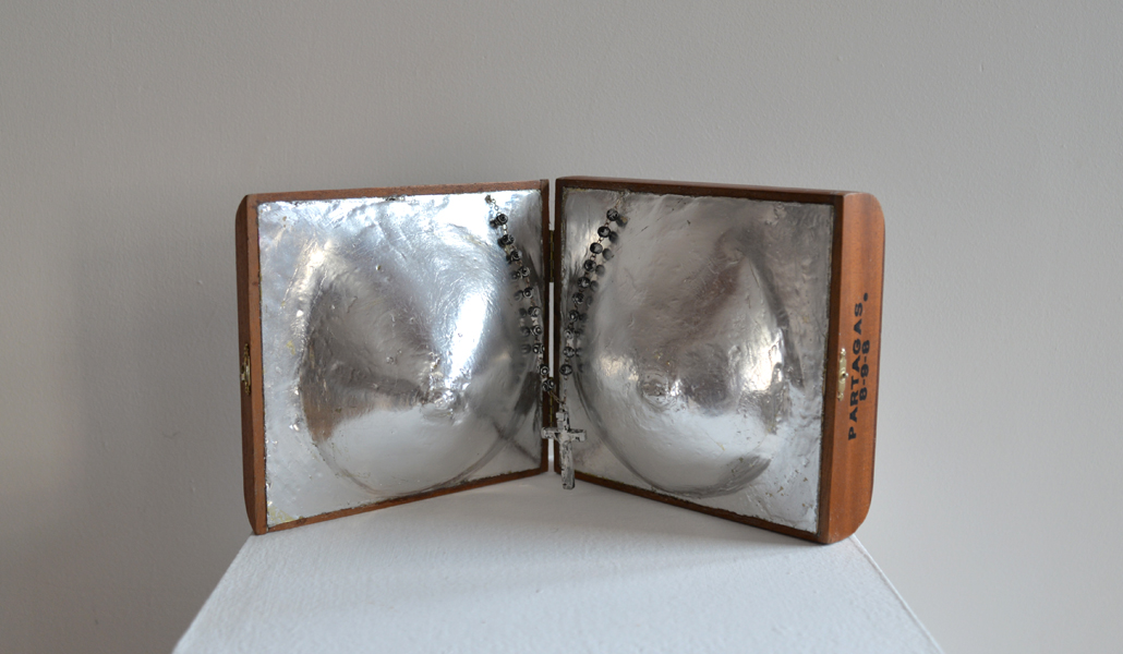 Shielded Madonna, wood cigar box, plaster, rosary, and silver leaf, 7" x 14" x 5.5", 2012
