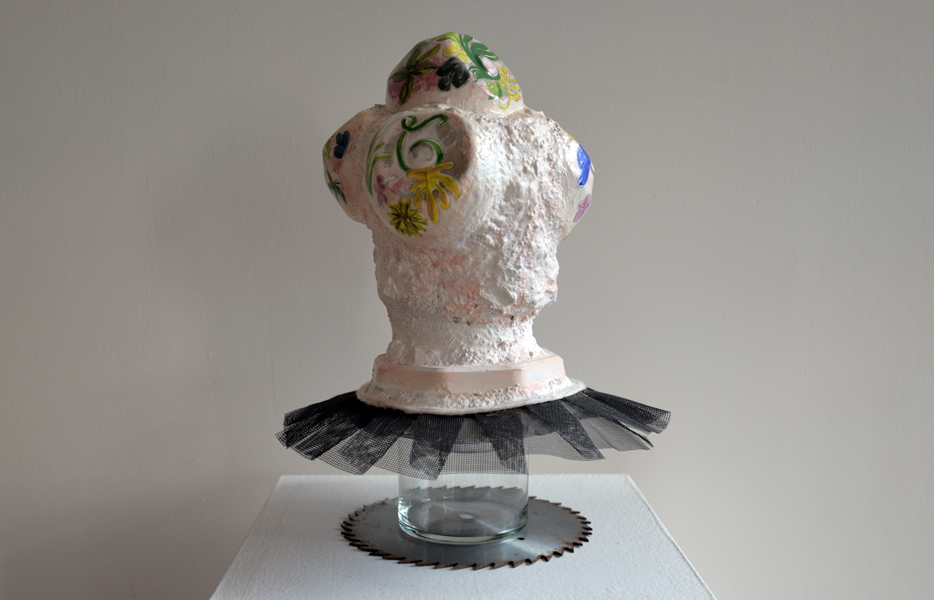 Hippolyta, cement, acrylics, netting, saw blade, and glass, 16" x 11" x 11", 2014