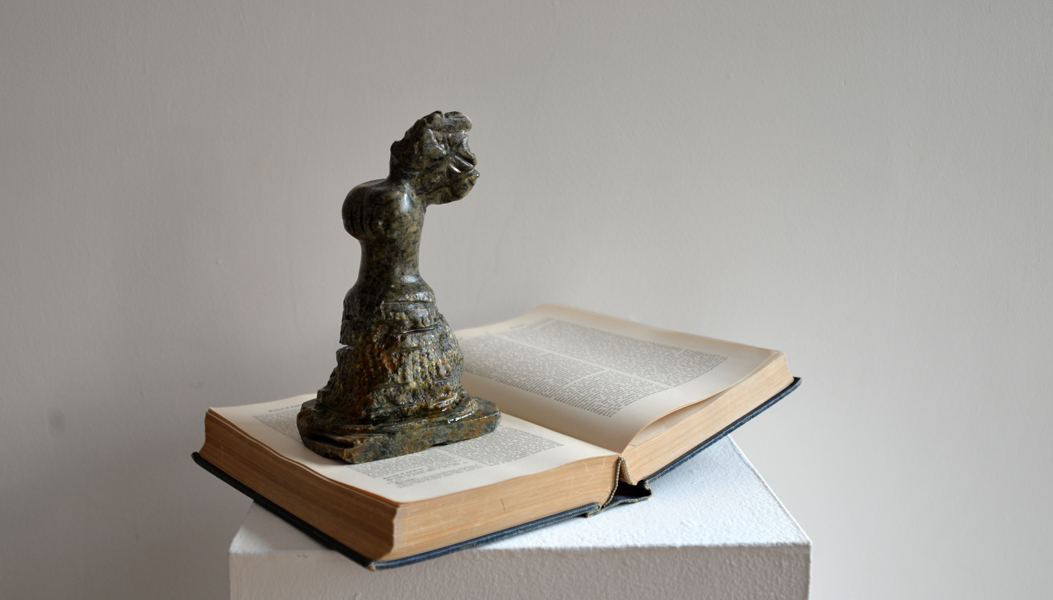 Broken Angel, soapstone and found Dictionary of the Bible, 9" x 9" x 8.5", 2014