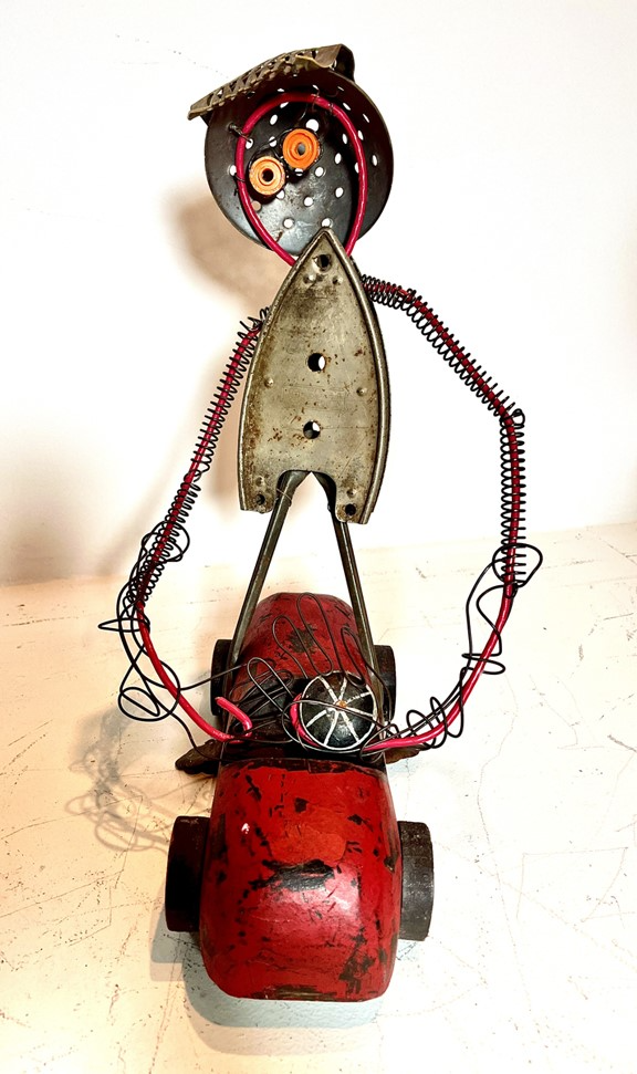 Bill Blaze, 8x14x10in, Mixed media sculpture with found objects, $850  .png