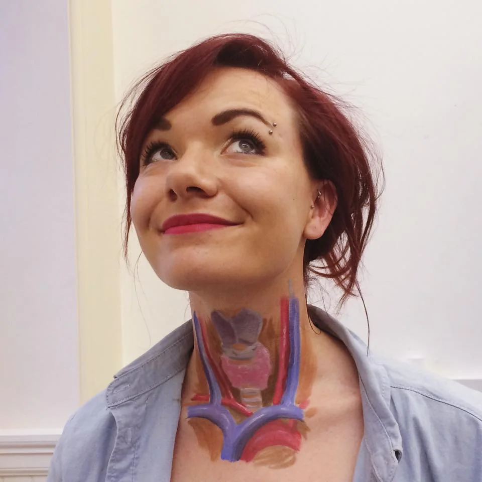 Here is a picture of medical artist, Emily McDougall, with my first attempt of anatomy body painting.