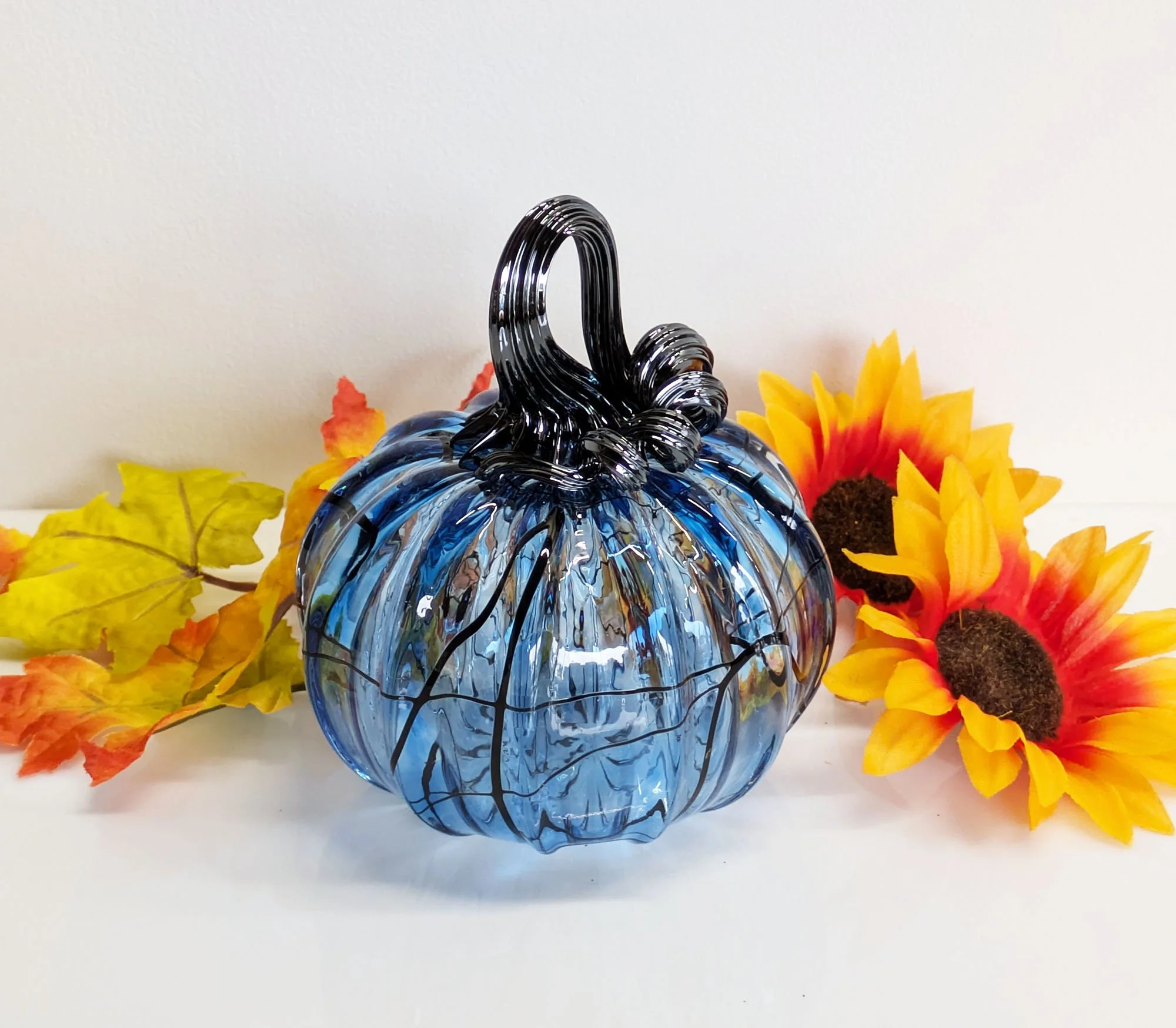 pumpkin of the year 2026 w leaves1.jpg